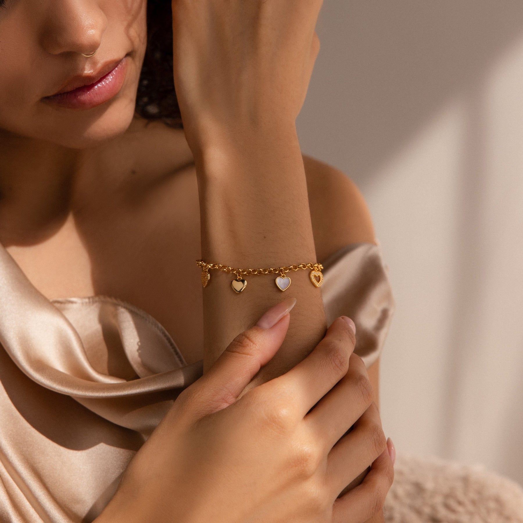 Pulseira com pingente de coração