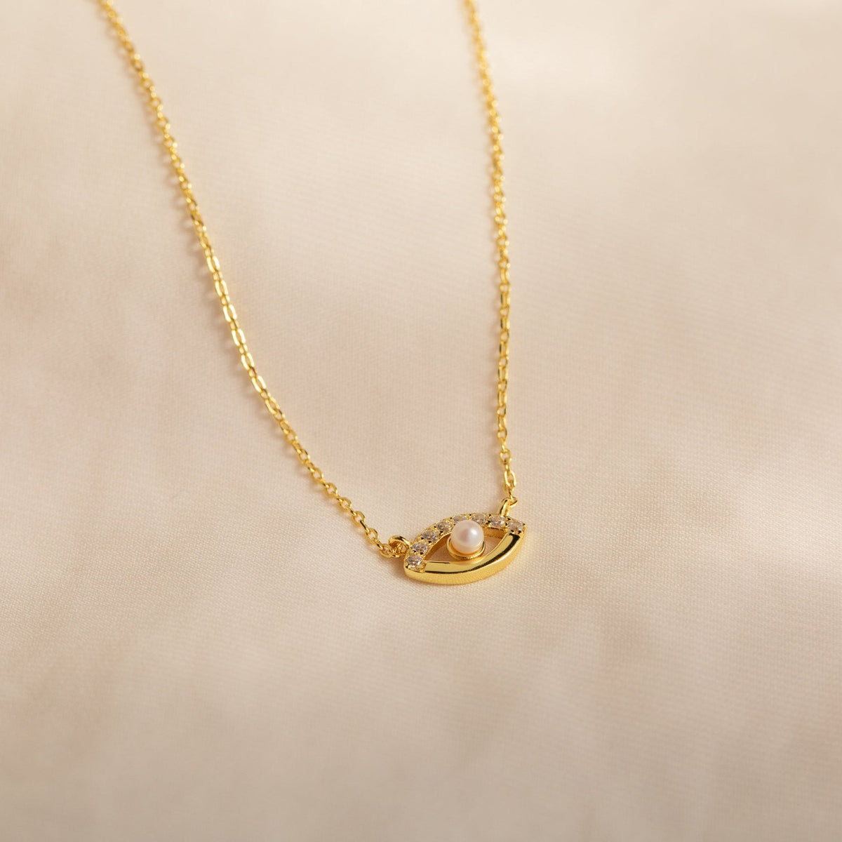 Colar de olho grego com pavê de amarílis