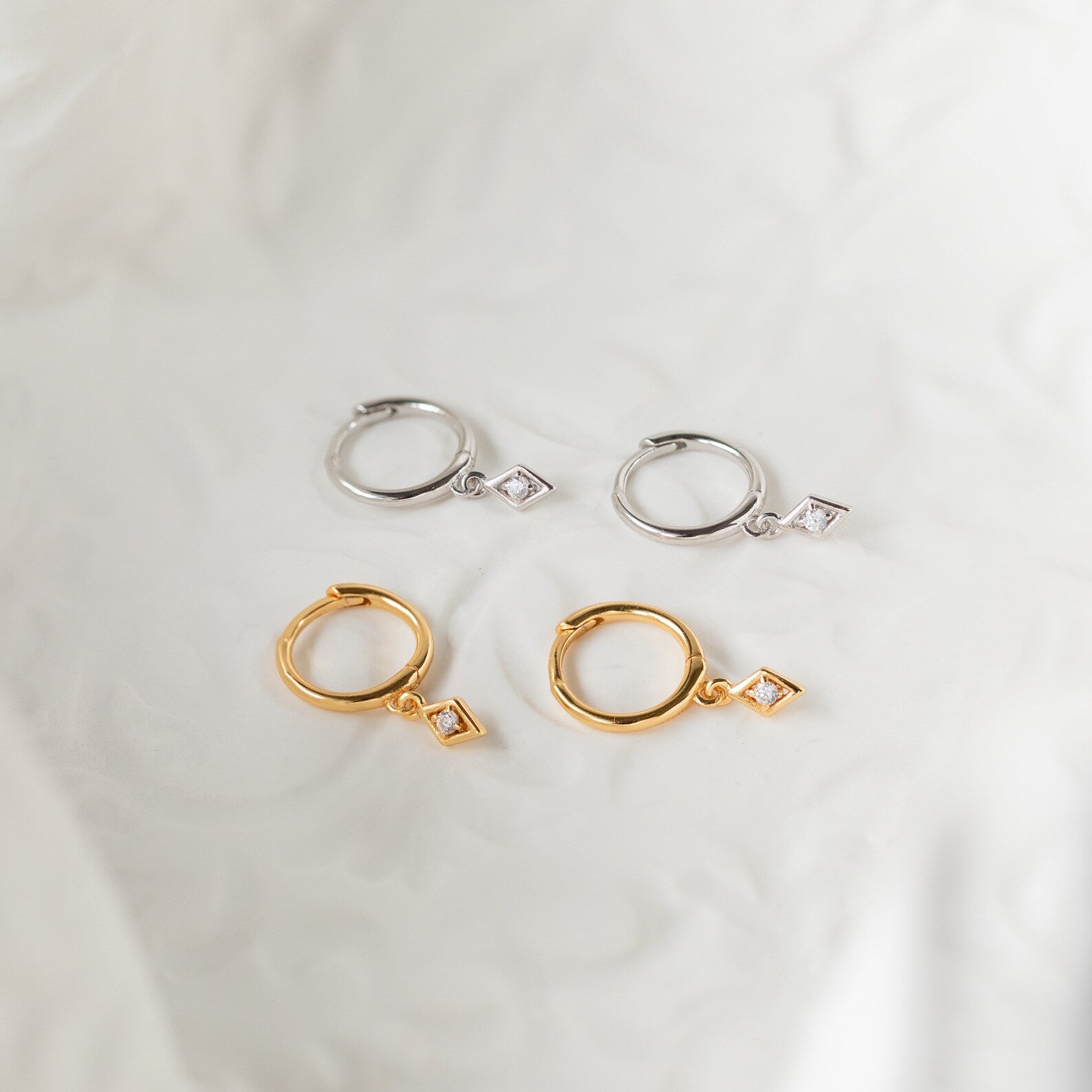 Brincos com diamantes Ericka