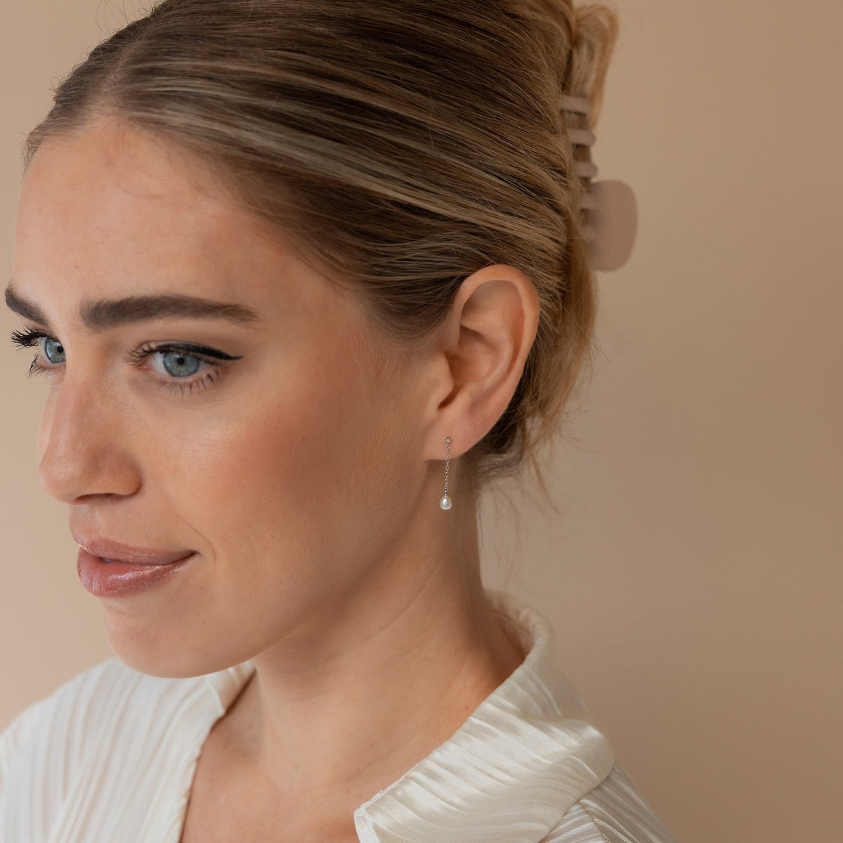 Brincos de pérola Isha