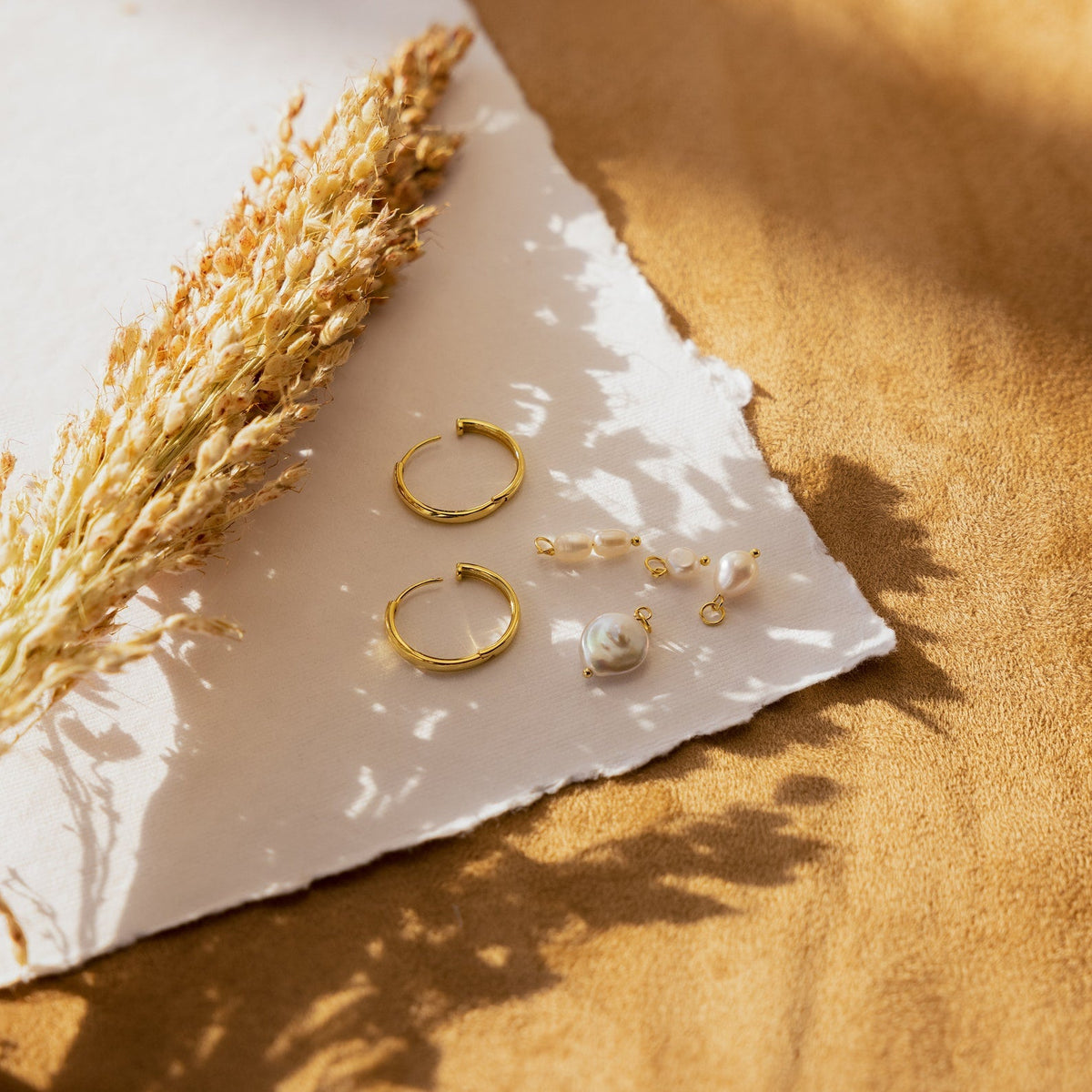 Conjunto de brincos de pérola