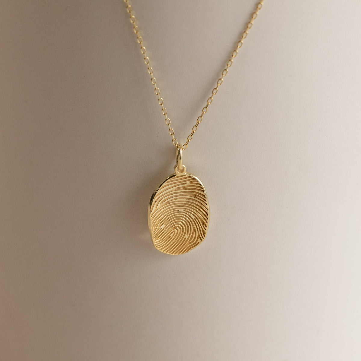 Colar de impressão digital