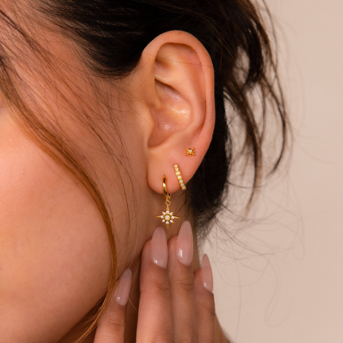 Conjunto de brincos estelar