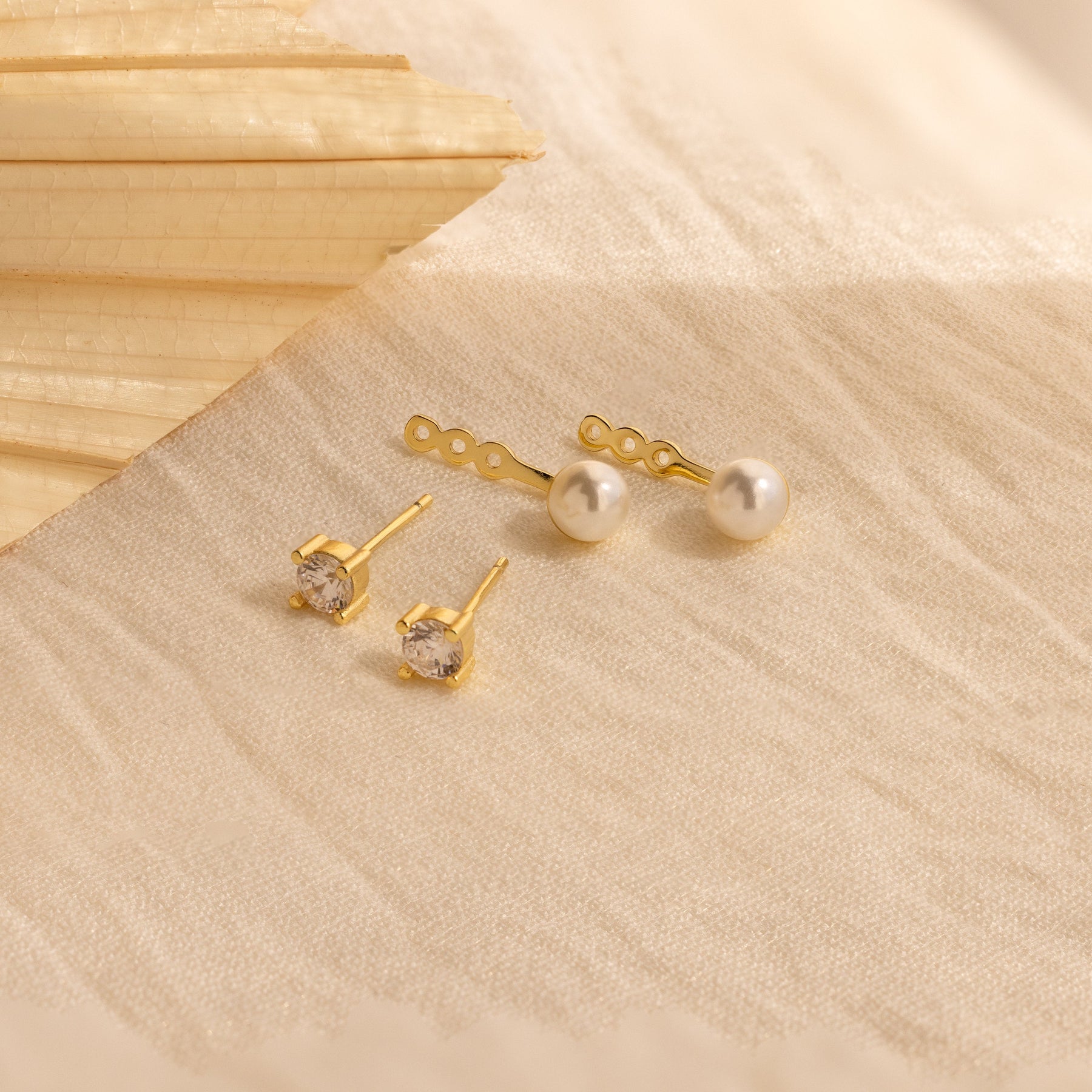 Casacos de orelha de pérola de diamante
