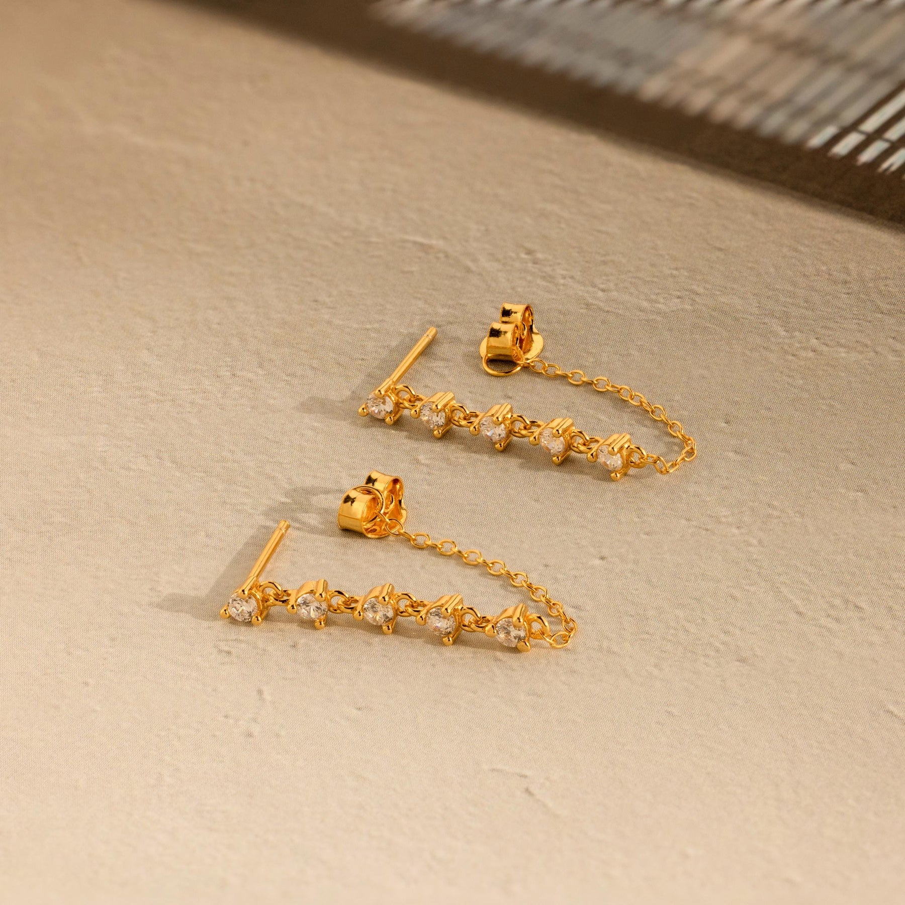 Brincos de corrente de diamante