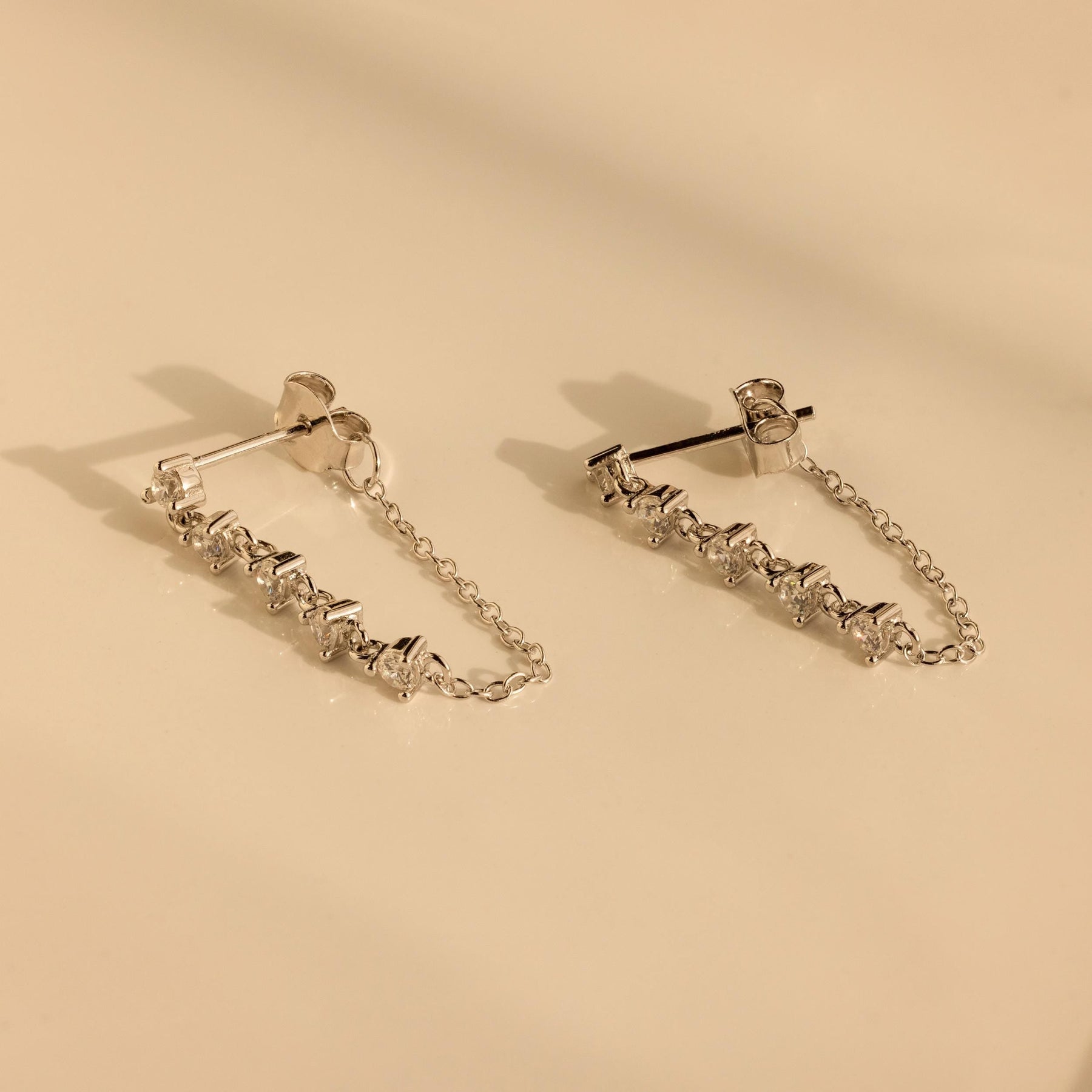 Brincos de corrente de diamante