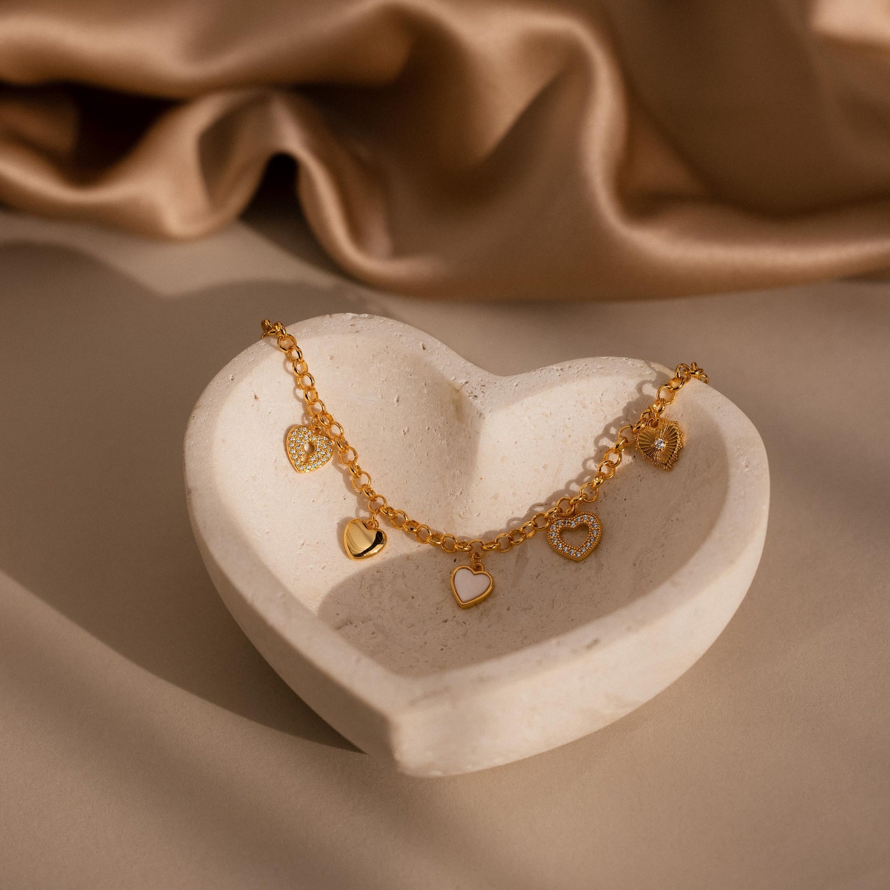Pulseira com pingente de coração