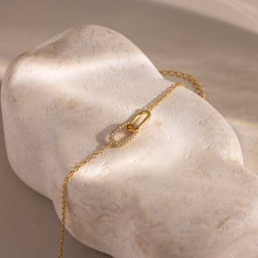 Pulseira com pingente de pavê