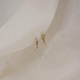 Brincos com gota de diamante