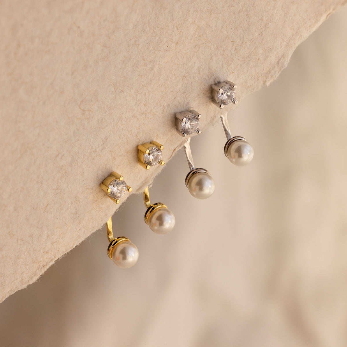 Casacos de orelha de pérola de diamante