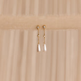 Brincos de corrente de pérolas e diamantes