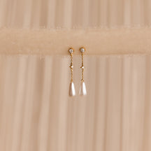 Brincos de corrente de pérolas e diamantes
