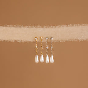 Brincos de corrente de pérolas e diamantes