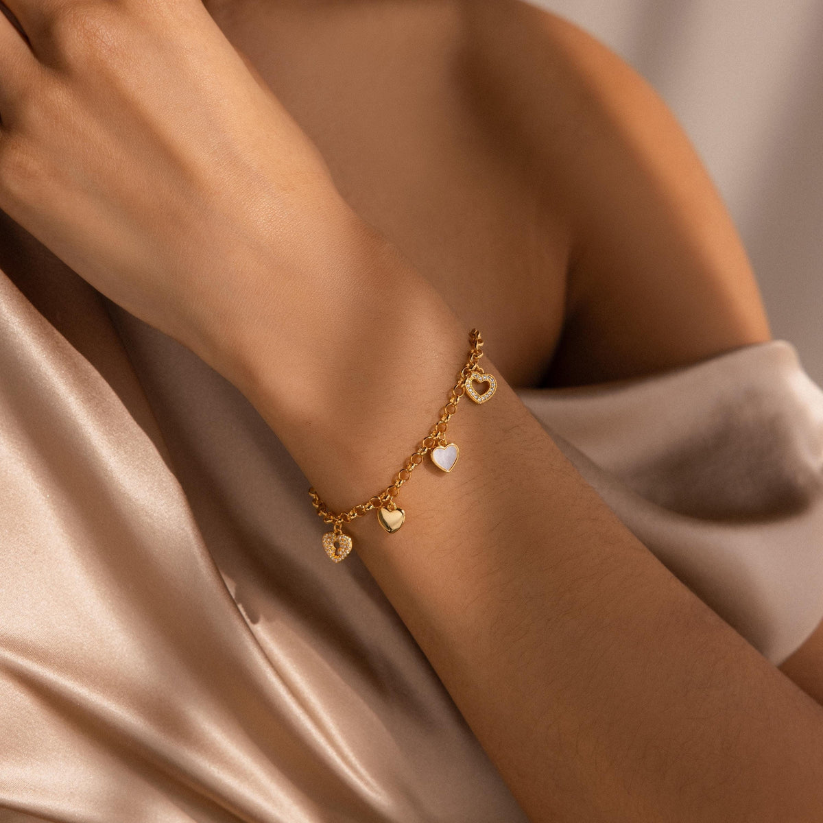 Pulseira com pingente de coração