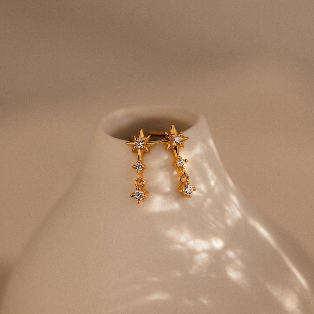 Brincos com Diamante estelar