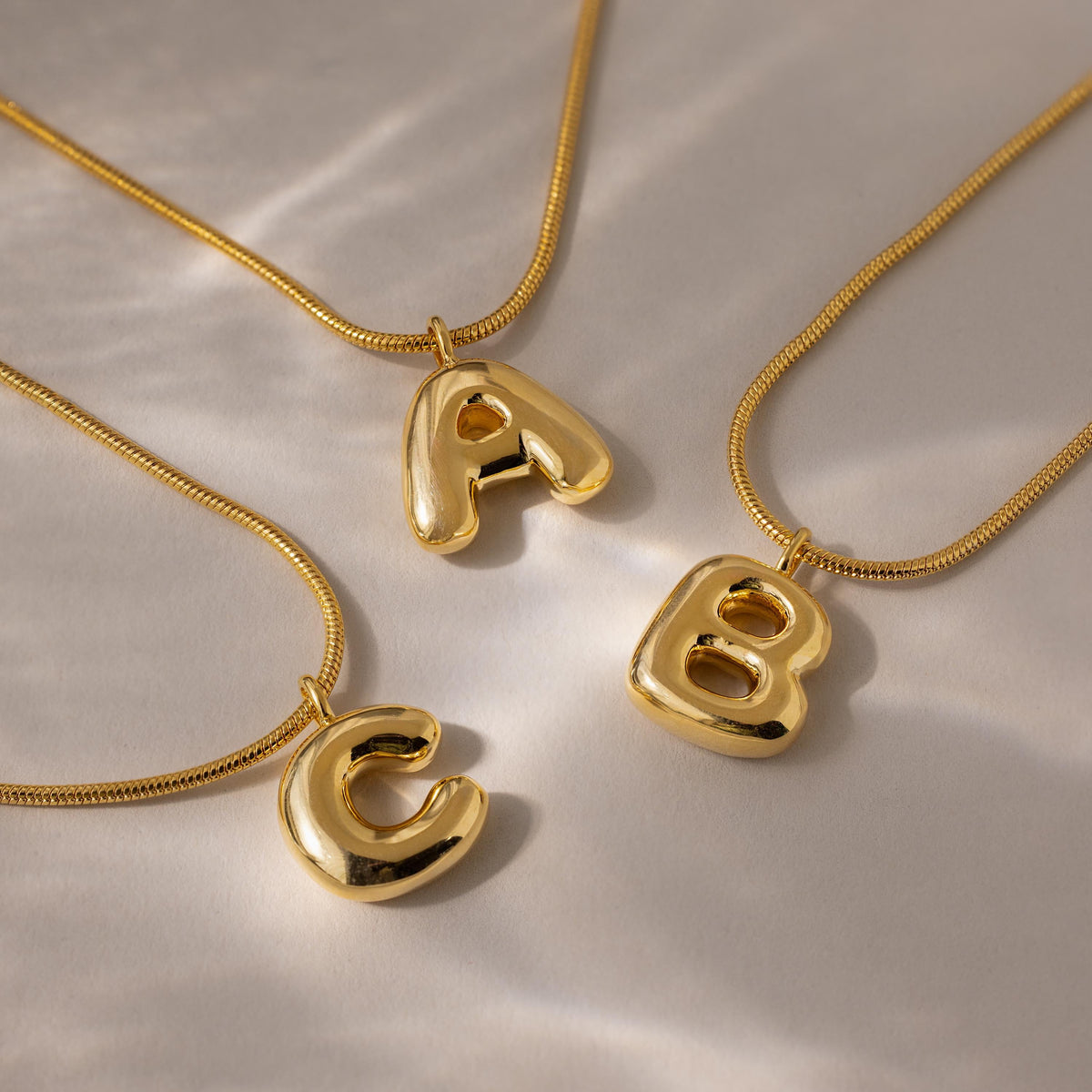 Bubble Letter Necklace in 18K Gold